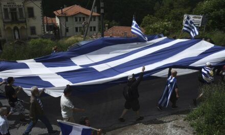 Dumb Bigot Rips Down Flag in an Act of Anti-Semitism Before Realizing it’s ACTUALLY a Greek Flag (WATCH)