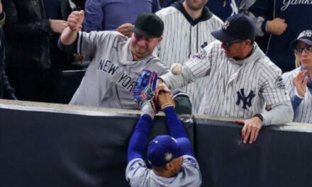 WATCH: Yankees Fan Tries to Tear the Glove Off Mookie Betts’ Hand