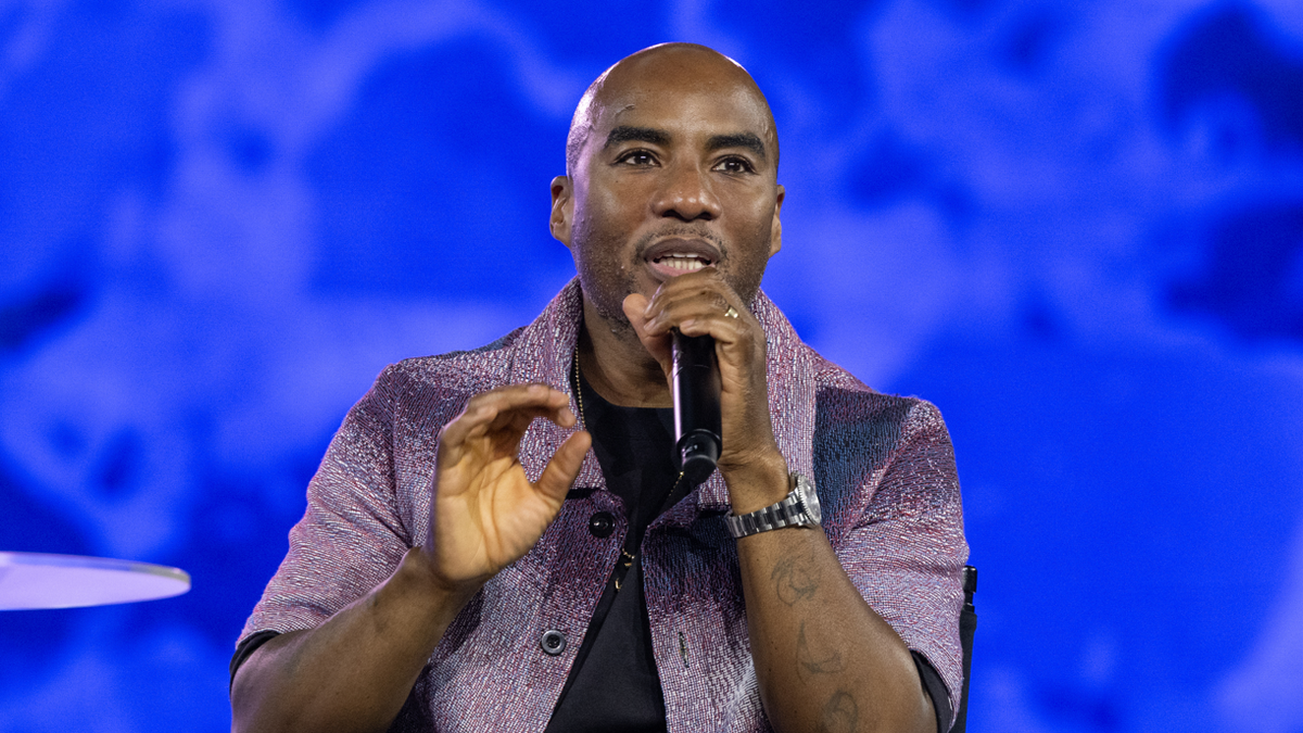 Charlamagne speaks on stage