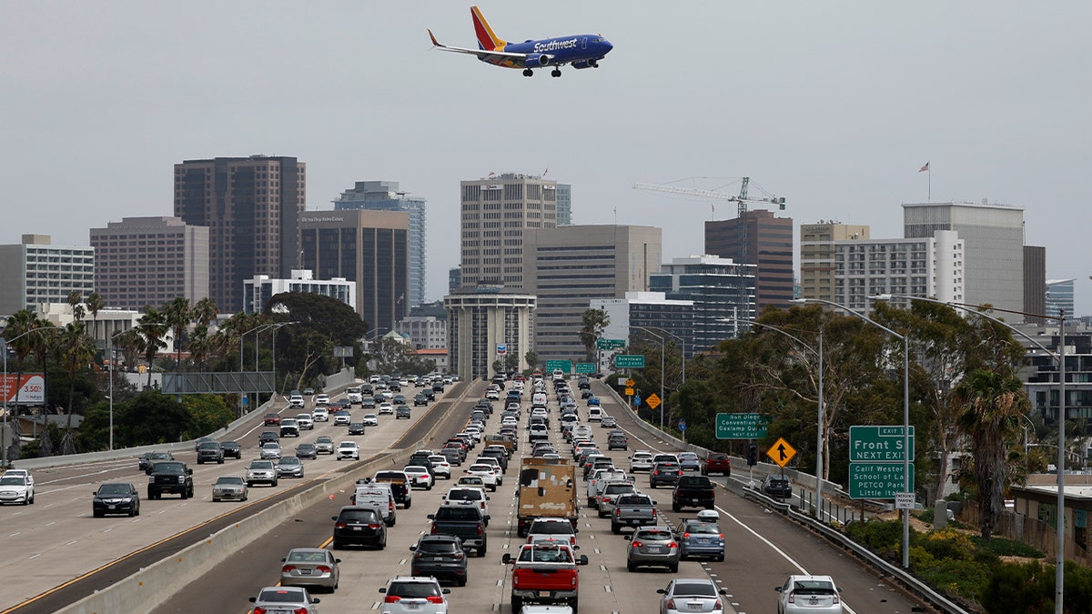 Traffic on southbound Interstate 5 slows during the afternoon commute heading into downtown San Diego on June 28, 2024.