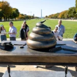 Bronze ‘Poop’ Sculpture Mocking Trump, Jan. 6 Protesters Is Erected Along D.C. National Mall