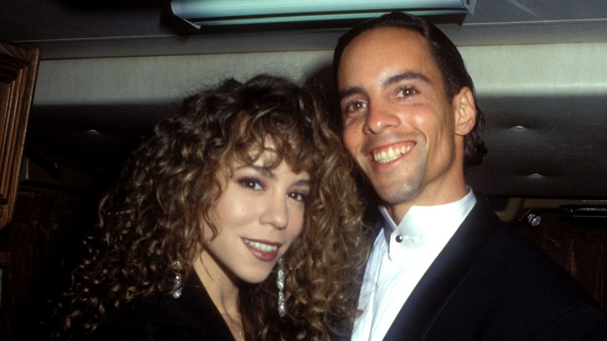 Carey with her brother Morgan in 1991