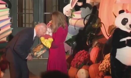 Biden Sees Baby In A Chicken Costume For Halloween, So Of Course He Pretends To Bite Him