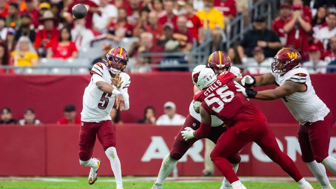 Washington Commanders QB Jayden Daniels rips a pass vs. the Arizona Cardinals in an NFL Week 5 at State Farm Stadium. (Mark J. Rebilas-Imagn Images)