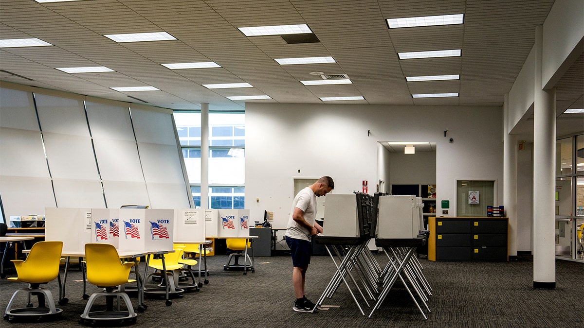 Michigan citizens voting early.