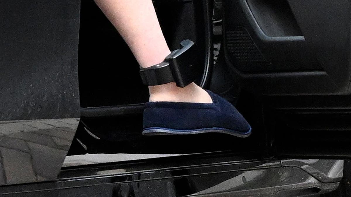 A close-up of the ankle monitor fitted to the leg of former Abercrombie and Fitch CEO Mike Jeffries.