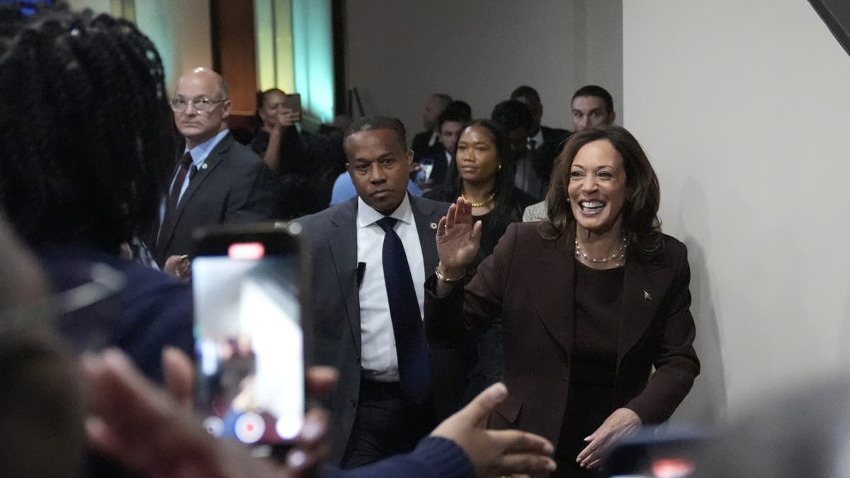 Harris waves while leaving a Philadelphia church