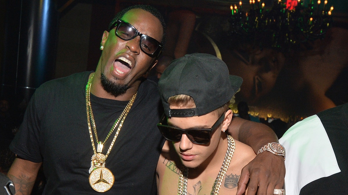 Justin Bieber goes shirtless at Sean Diddy Combs tequila launch