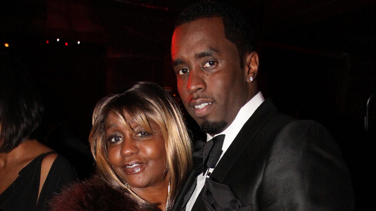 Sean Diddy Combs smiles next to his mother, Janice Combs.