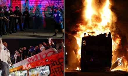 Dodgers celebrations erupt into chaos as ‘hostile’ crowd hurls projectiles at officers, sets city bus ablaze