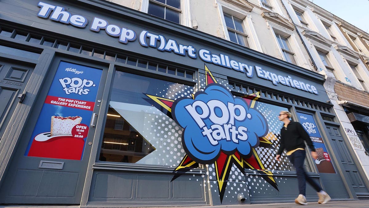 A sign for the Pop (T)Art Gallery Experience and the pop tarts logo.