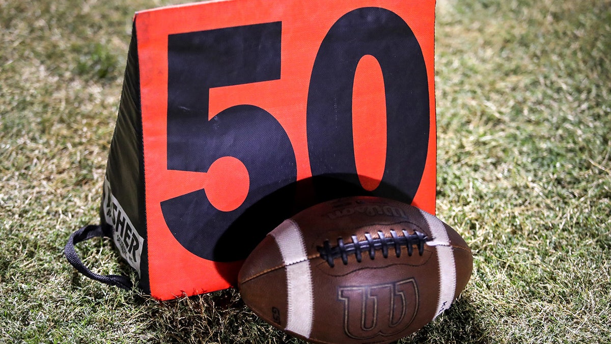 Football and yard marker