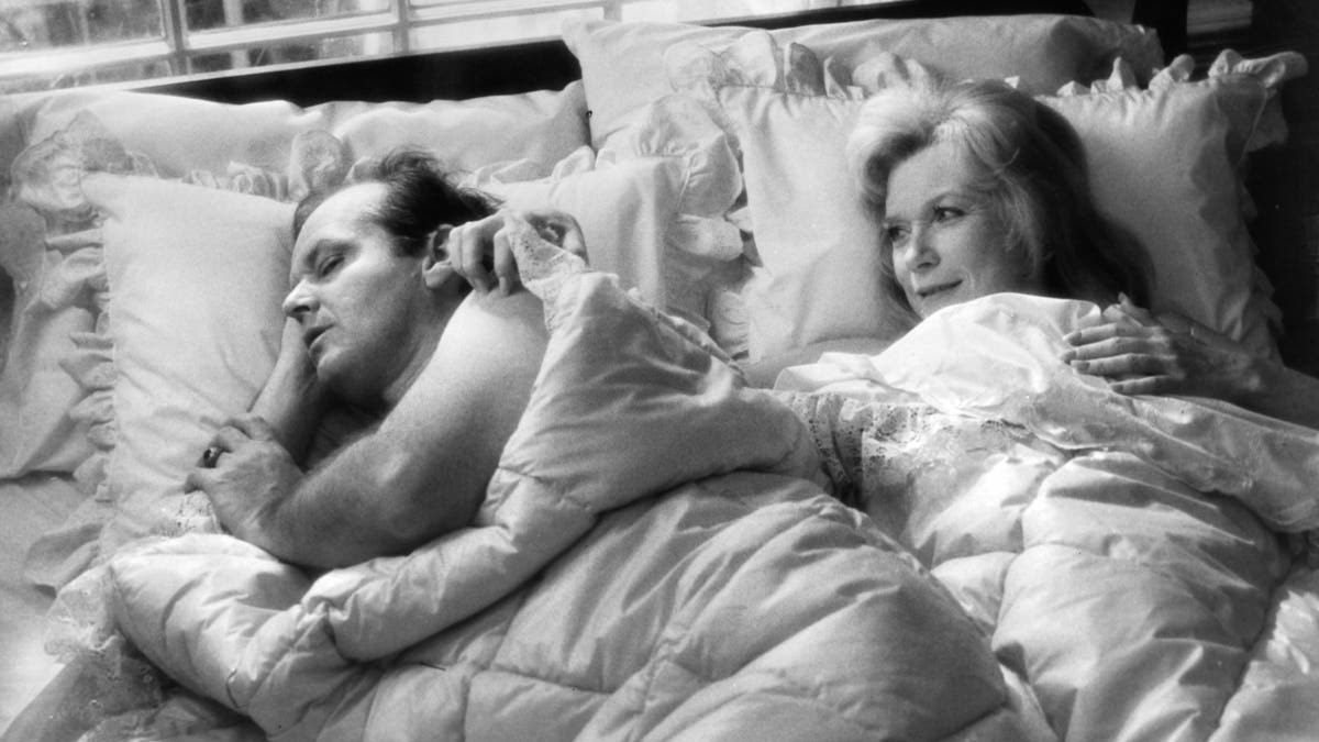 Jack Nicholson sleeps next to Shirley MacLaine in a scene from the film 'Terms Of Endearment'