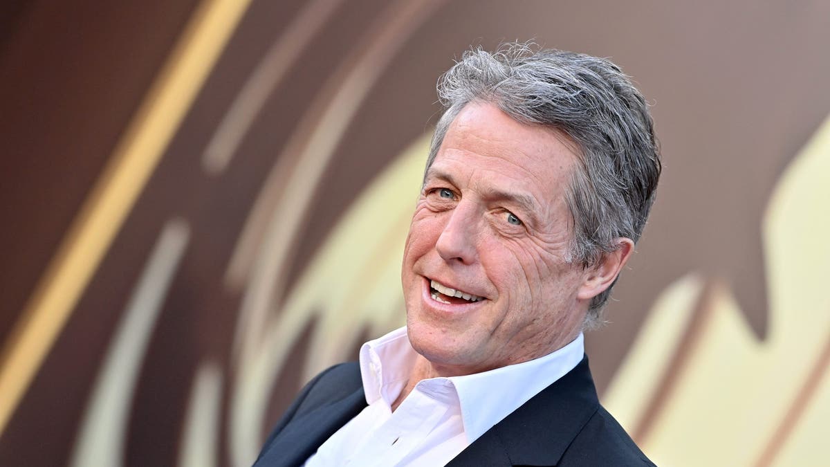 Hugh Grant smiling