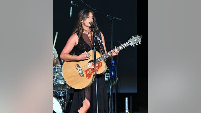 ALPHARETTA, GEORGIA - APRIL 19: Singer Ella Langley performs onstage at Ameris Bank Amphitheatre on April 19, 2024 in Alpharetta, Georgia. (Photo by Paras Griffin/Getty Images)