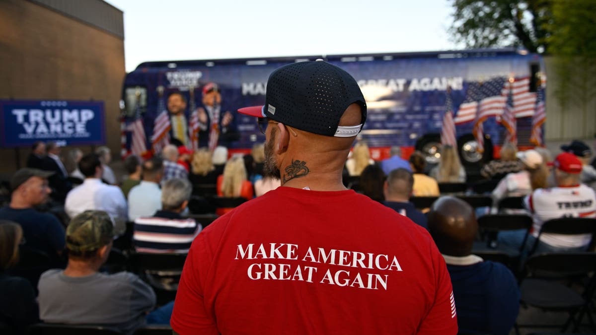 MAGA shirt at Team Trump bus tour 