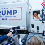 Trump Shows Up To Wisconsin Rally In Garbage Truck After Joe Biden Comments