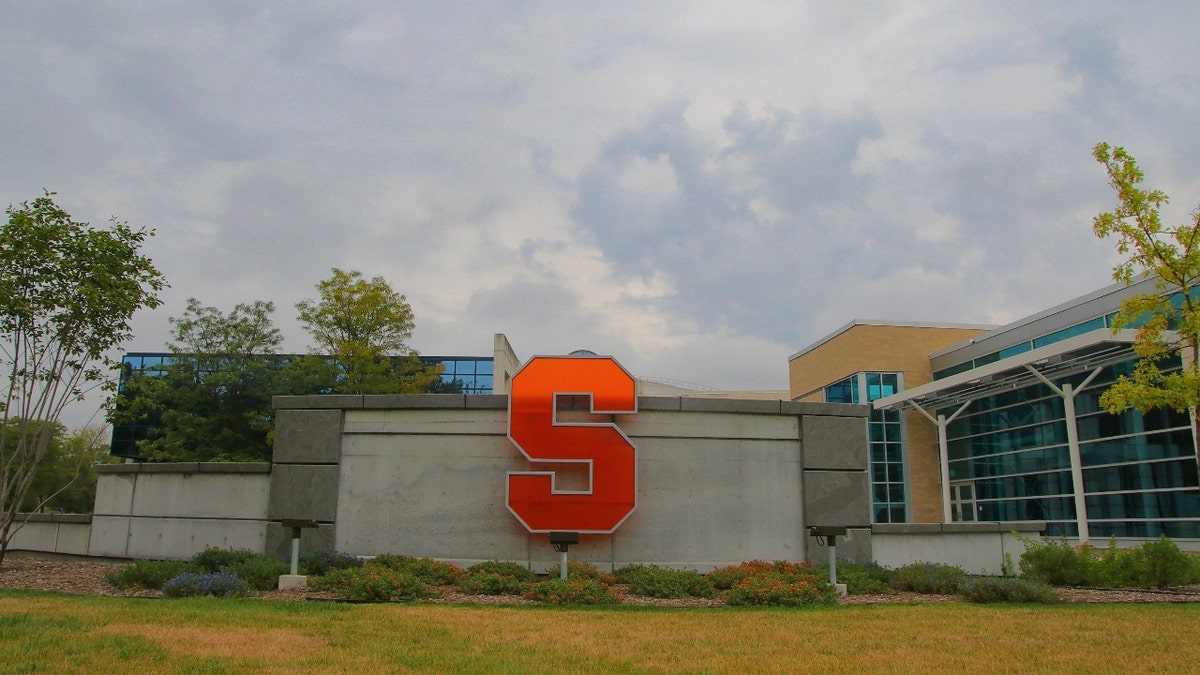 A building on Syracuse's campus showing an orange letter 