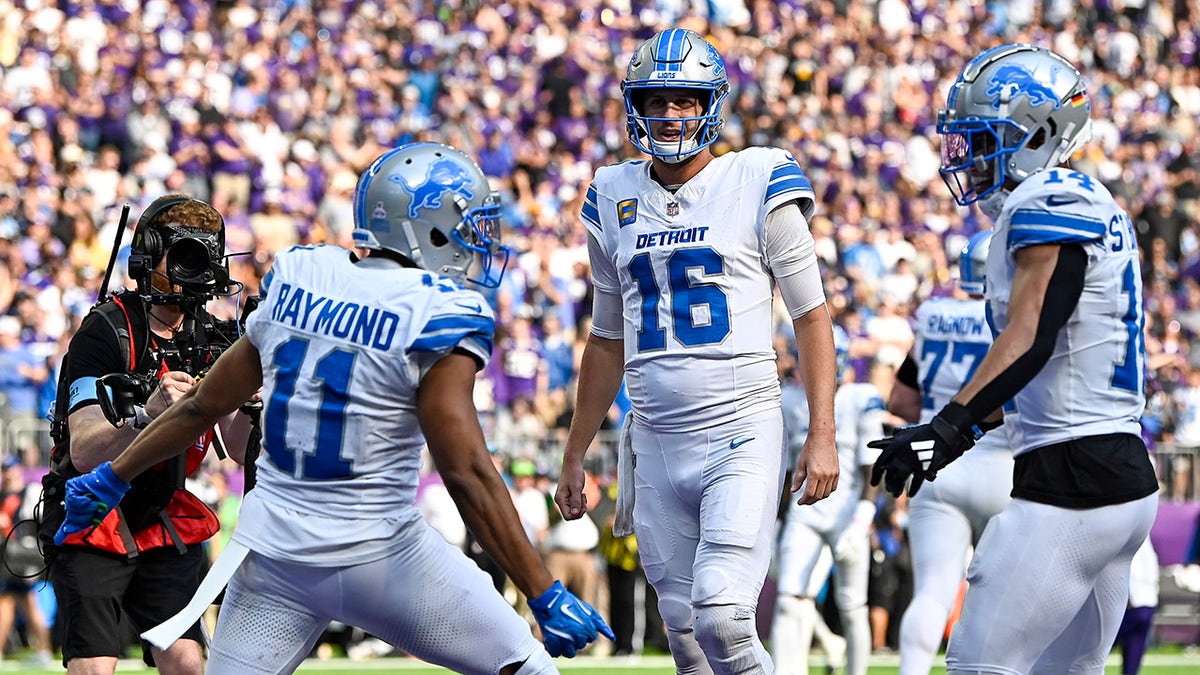 Jared Goff and Khalif Raymond