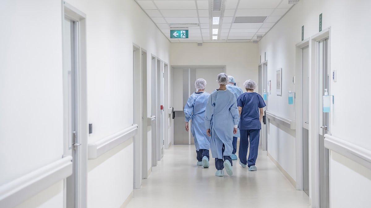 nurses in hospital hallway