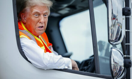 Trump Wears Hi-Viz Vest, Rides in Garbage Truck at Wisconsin Rally