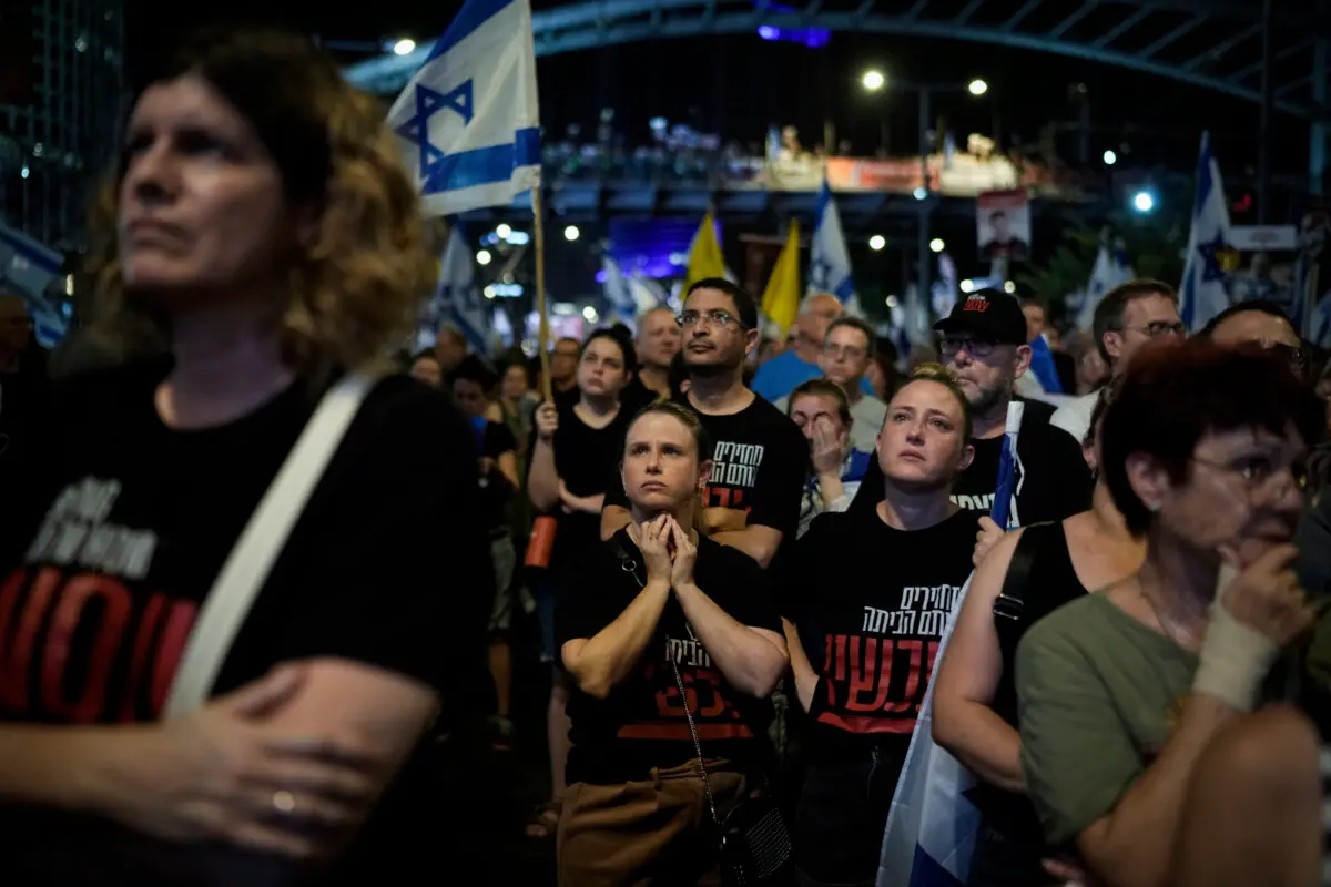 People protest against Prime Minister Benjamin Netanyahu's government and call for the release of hostages held in the Gaza Strip by the Hamas militant group, in Tel Aviv, Israel, on Sept. 7, 2024. (AP Photo/Leo Correa)