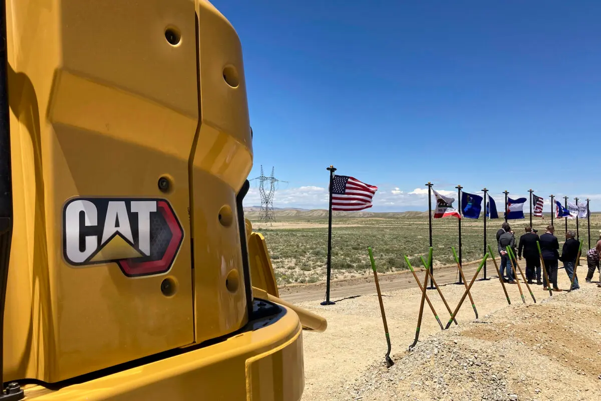 Heavy equipment sits at the site of a groundbreaking ceremony for the TransWest Express transmission line project south of Rawlins, Wyo., on June 20, 2023. (Mead Gruver /AP Photo)