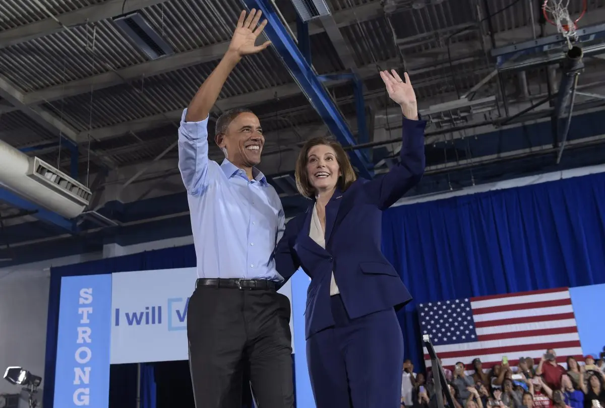 Former President Barack Obama and Sen. Catherine Cortez Masto (D-Nevada) during an October 2016 campaign rally at Cheyenne High School in North Las Vegas, Nev. (Susan Walsh/AP Photo)