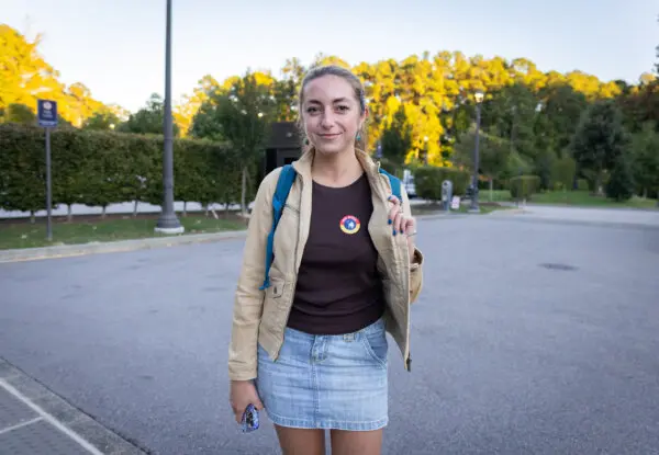 Duke University student Dana Baca finishes casting her vote in Durham, N.C., on Oct. 17, 2024. (John Fredricks/The Epoch Times)