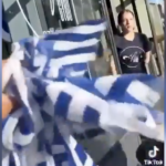 Anti-Israel nincompoop tears down what she THINKS are Jewish flags, but needs a geography lesson