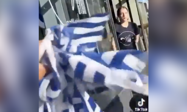 Anti-Israel nincompoop tears down what she THINKS are Jewish flags, but needs a geography lesson