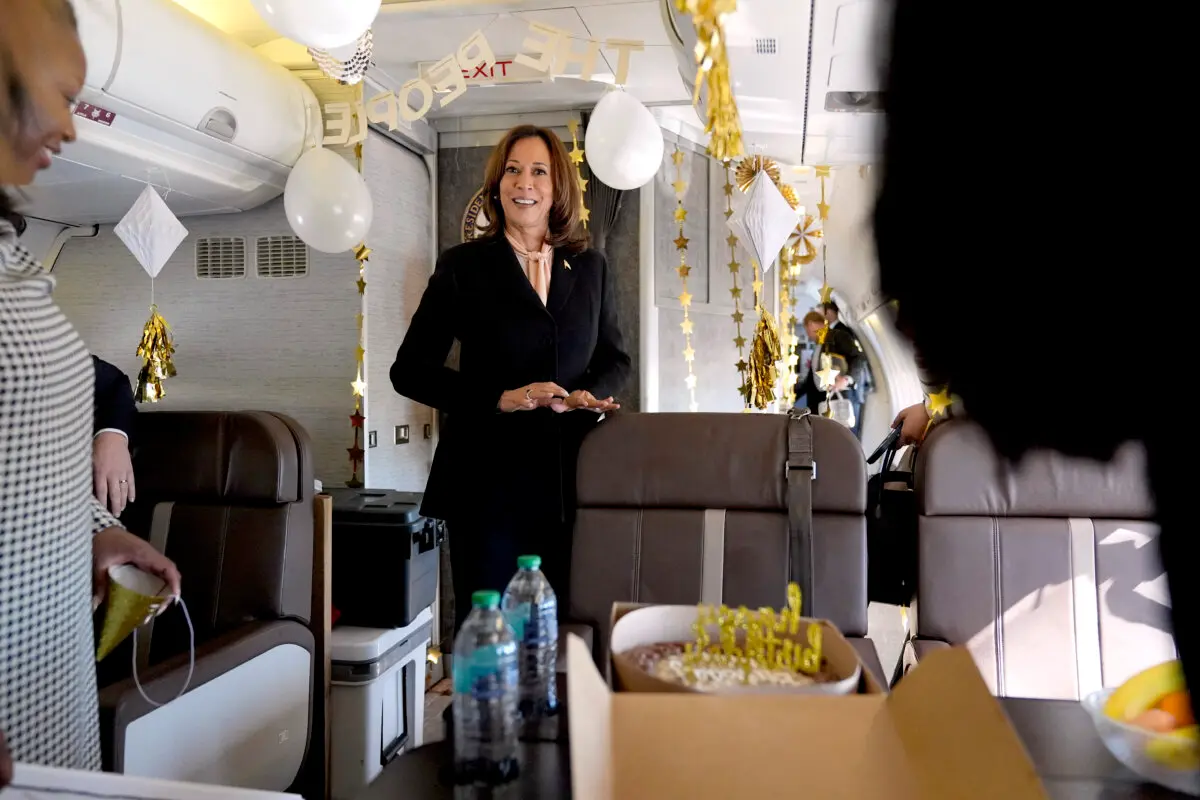 Vice President Kamala Harris is surprised by campaign staff with birthday decorations before departing Hartsfield-Jackson Atlanta International Airport in Atlanta on Oct.20, 2024, enroute to Philadelphia. (Jacquelyn Martin/Pool/AFP via Getty Images)