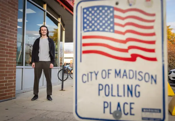 Connor Stuart completes voting in Madison, Wis., on Oct. 22, 2024. (John Fredricks/The Epoch Times)