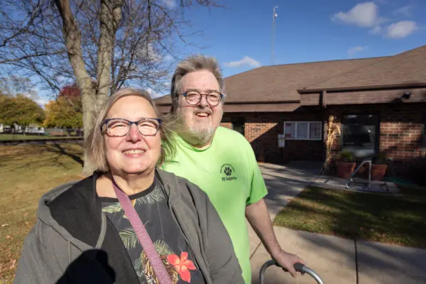 Voters Connie and Philip Sierlecki walk to their car in Johnson Creek, Wis., on Oct. 23, 2024. (John Fredricks/The Epoch Times)