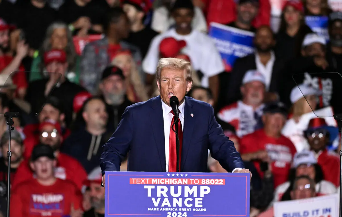 Former US President and Republican presidential candidate Donald Trump speaks during a campaign rally at Huntington Place in Detroit, Michigan, October 18, 2024. (Photo by Jim WATSON / AFP) (Photo by JIM WATSON/AFP via Getty Images)