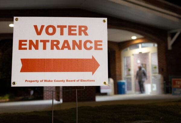 A sign directs voters in Wake County, N.C., on Oct. 17, 2024. (John Fredricks/The Epoch Times)