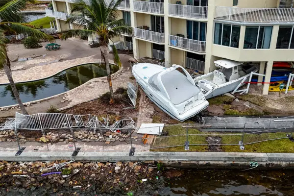 Boats pushed ashore by floodwaters from Hurricane Helene, in St. Petersburg, Fla., on Sept. 28, 2024. (Mike Carlson/AP Photo)