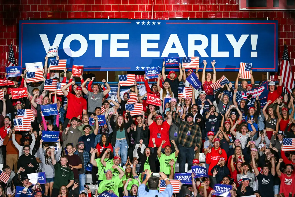 Supporters wait for the arrival of former President Donald Trump during a campaign rally at Saginaw Valley State University in Saginaw, Mich., on Oct. 3, 2024. (Jim Watson/AFP via Getty Images)