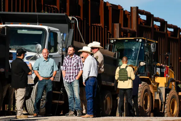 Republican vice presidential nominee Sen. JD Vance (R-OH) talks to local law enforcement, boarder patrol officials and ranchers as he tours the U.S. Border Wall in Montezuma Pass, Ariz., on Aug. 1, 2024. (Anna Moneymaker/Getty Images)