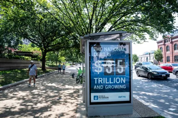 The national debt clock at a bus station in Washington, DC, on Aug. 6, 2024. (Madalina Vasiliu/The Epoch Times)