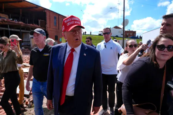 Republican presidential nominee former President Donald Trump walks outside the Chez What furniture store as he visits Valdosta, Ga., on Sept. 30, 2024. (Evan Vucci/AP Photo)