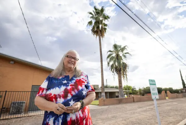 Mary Jo Odom casts her early ballot in Tucson, Arizona, on Oct. 9, 2024. (John Fredricks/The Epoch Times)