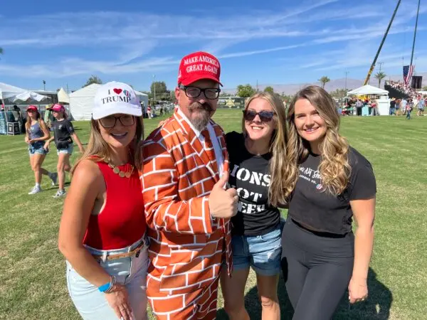 (L-R) Truimp supporters, Erika Weinhold, Blake Maxwell, known for his brick suit, Kara Eckert, and Breanna Van Deventer at the Trump rally in Coachella, Calif., on Oct. 12, 2024. (Brad Jones/The Epoch Times)