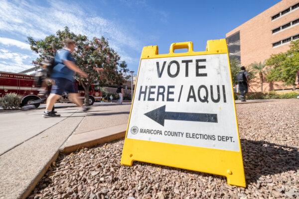 Voters prepare to cast their early-ballots in Tempe, Ariz., on Oct. 10, 2024. (John Fredricks/The Epoch Times)