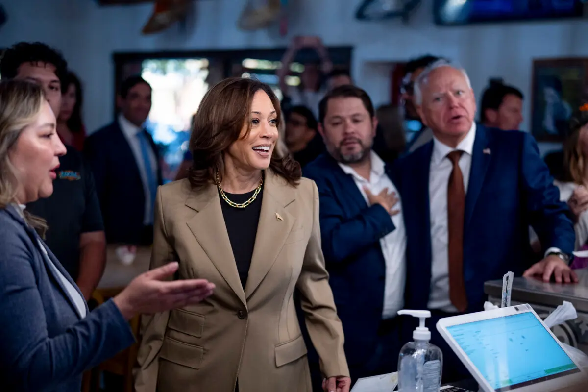 Vice President Kamala Harris, Rep. Ruben Gallego (D-Ariz.) (2nd-R), and Democratic vice presidential candidate Minnesota Gov. Tim Walz (R) order food at Cocina Adamex restaurant in Phoenix, Ariz., on Aug. 9, 2024. (Andrew Harnik/Getty Images)