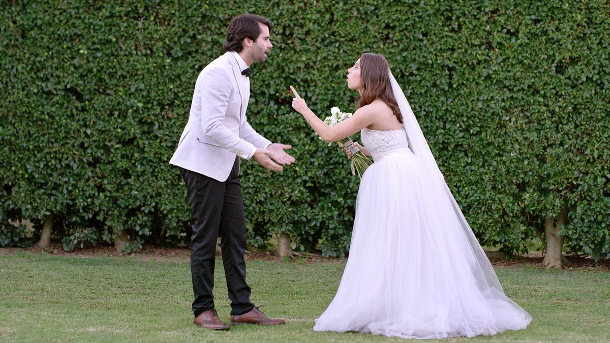 couple having an argument on their wedding day