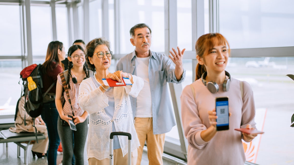 people boarding plane