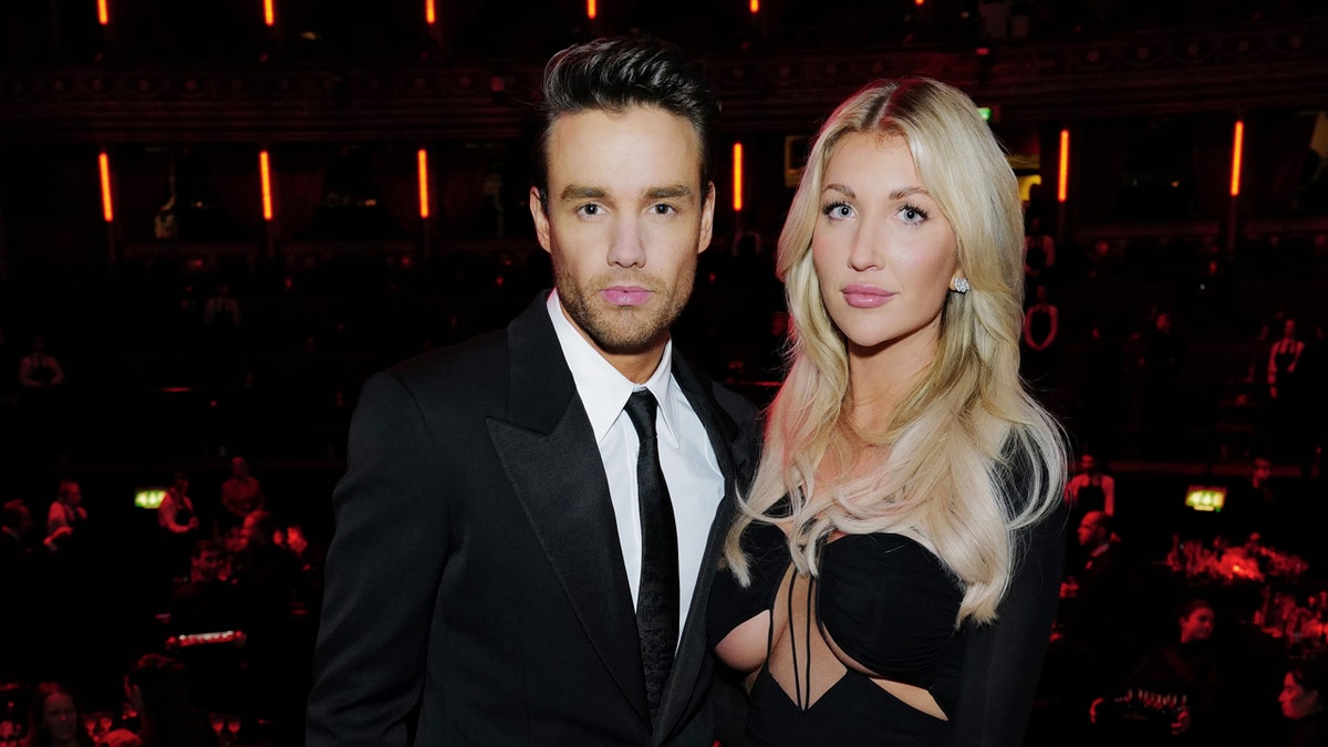 Liam Payne and his girlfriend Kate Cassidy attend an event