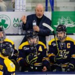 College hockey equipment manager forced to play goalie in huge NCAA Division I game