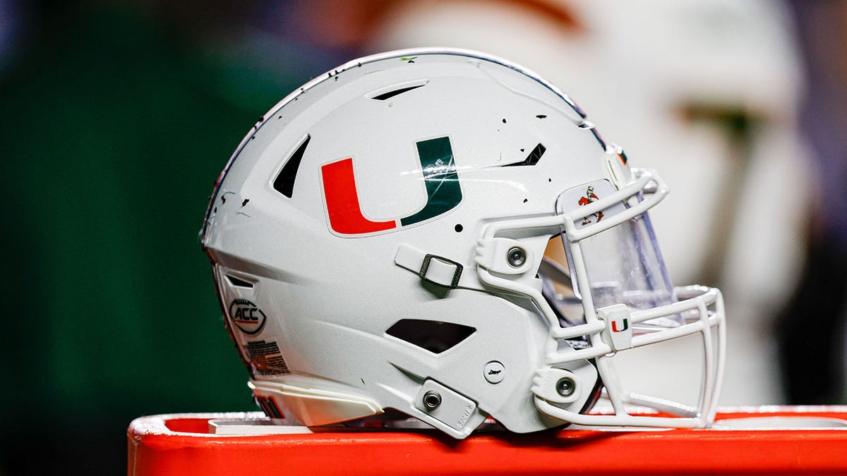 A Miami Hurricanes helmet on the sidelines